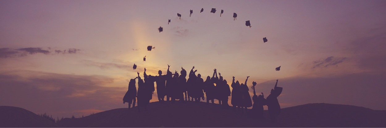 Graduates2 Graduates throwing caps
